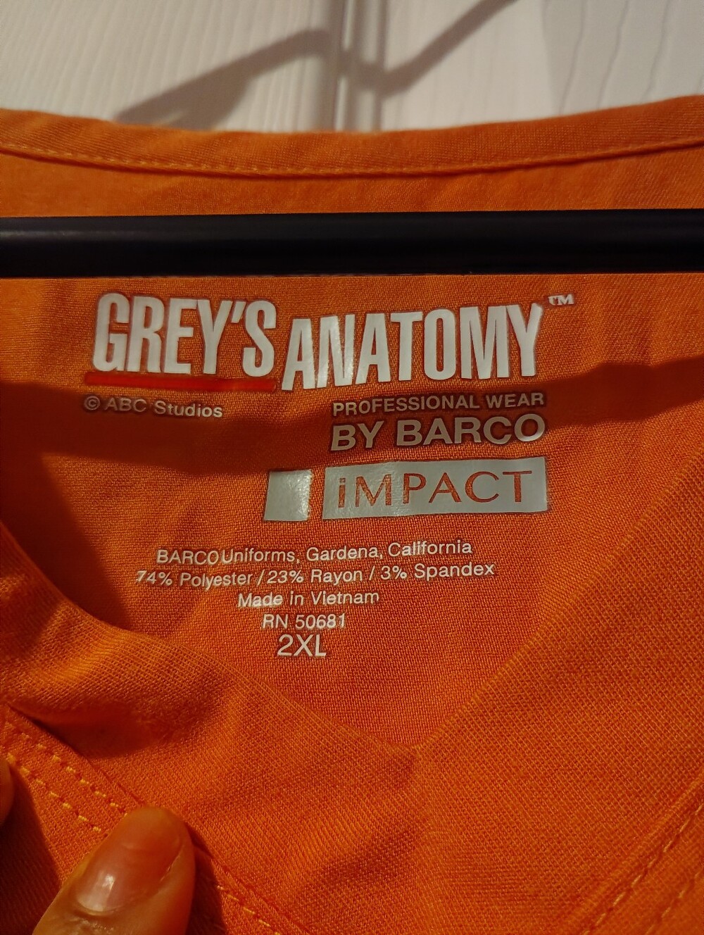 Grey's Anatomy by Barco Professional Wear. Bright Papaya Color